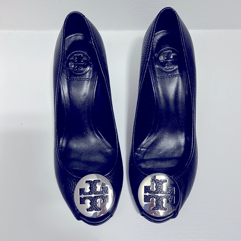 Beautiful Tory Burch peep toe pumps with silver Tory emblem. Gently worn.